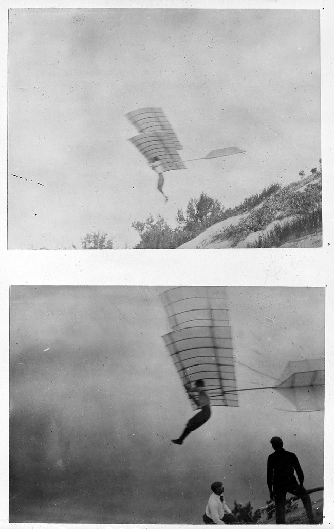 Black and white historic photographs of a man hanging from a bi-wing glider as he glides from the top of a dune.