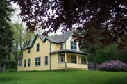 Yellow, two story home is now a research laboratory. Yellow, two story home is now a research laboratory.