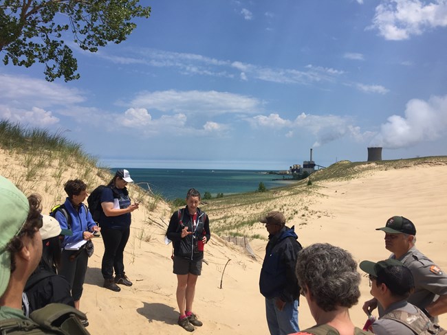 Park staff, scientists, and iSWOOP staff discuss Mt. Baldy on its summit.
