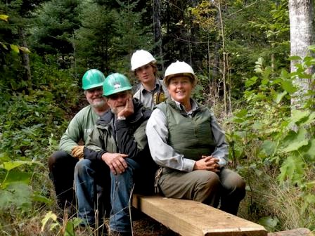 Volunteers and park staff pose for a photograph