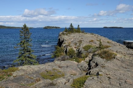 A rocky point surrounded by water