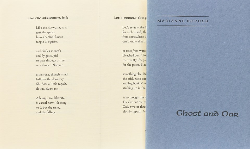 A photo shows a page of poetry and a book cover