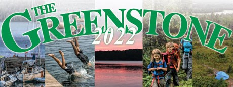 5 vertical images showing from right to left, boats at dock, kids diving off a dock, a pink sunset, backpacking kids on a trail, a tent viewed from afar. THE GREENSTONE 2022 is superimposed across the 5 images.