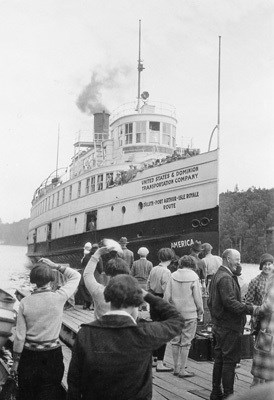 SS America arriving to large waiting crowd on dock