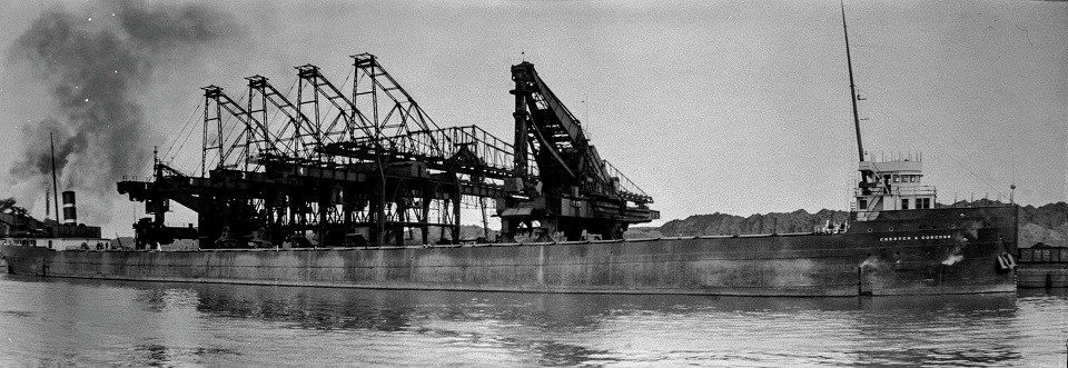 wide photo of the SS Chester A. Congdon being loaded with grain
