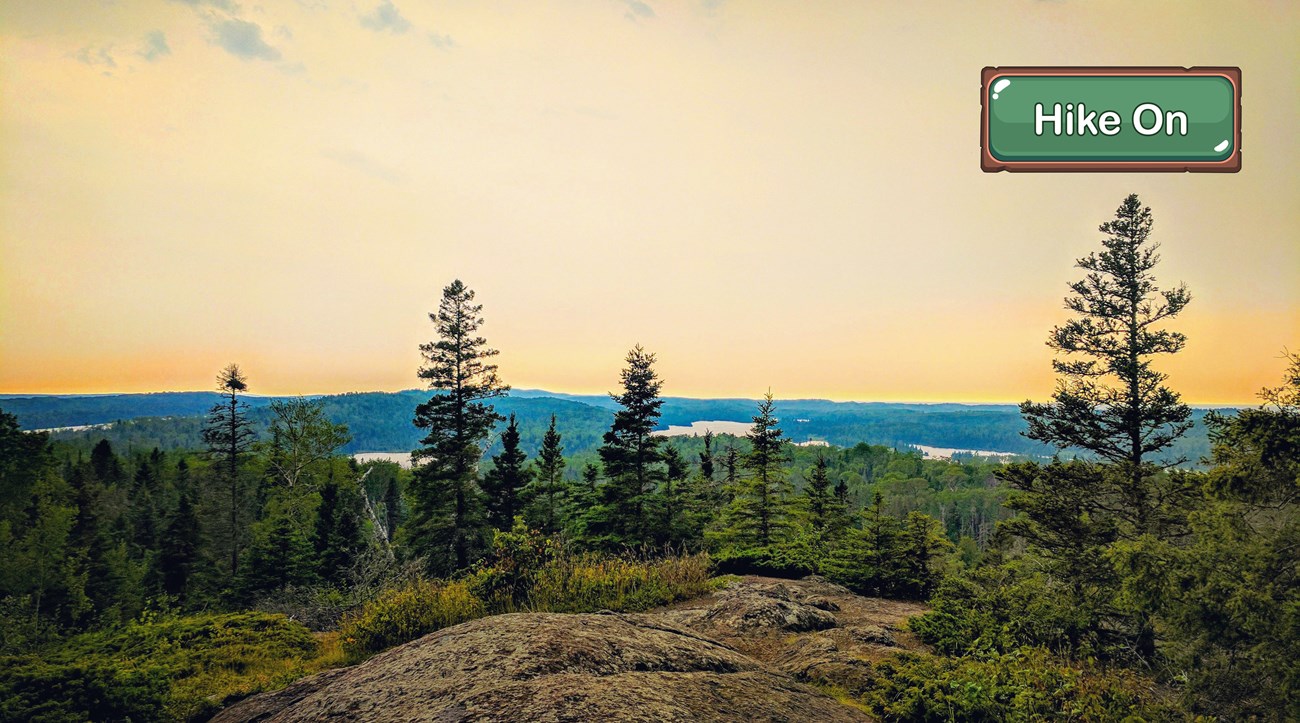 Sunset on a rocky ridge line.