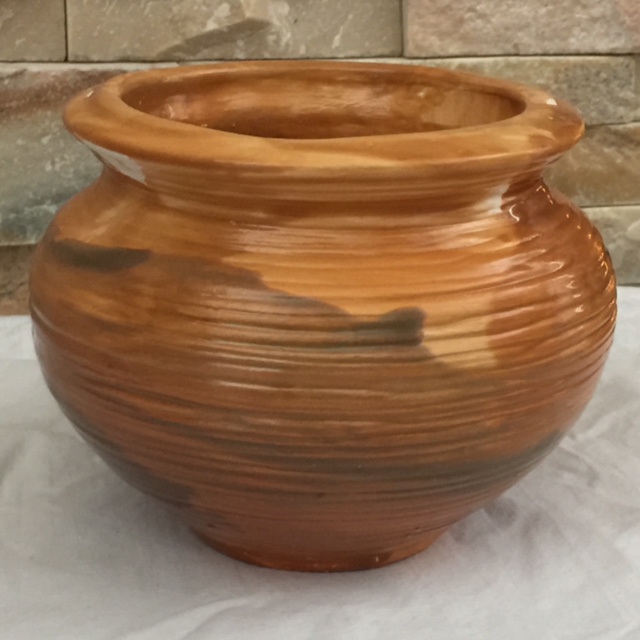 Large ceramic pottery with a copper glaze