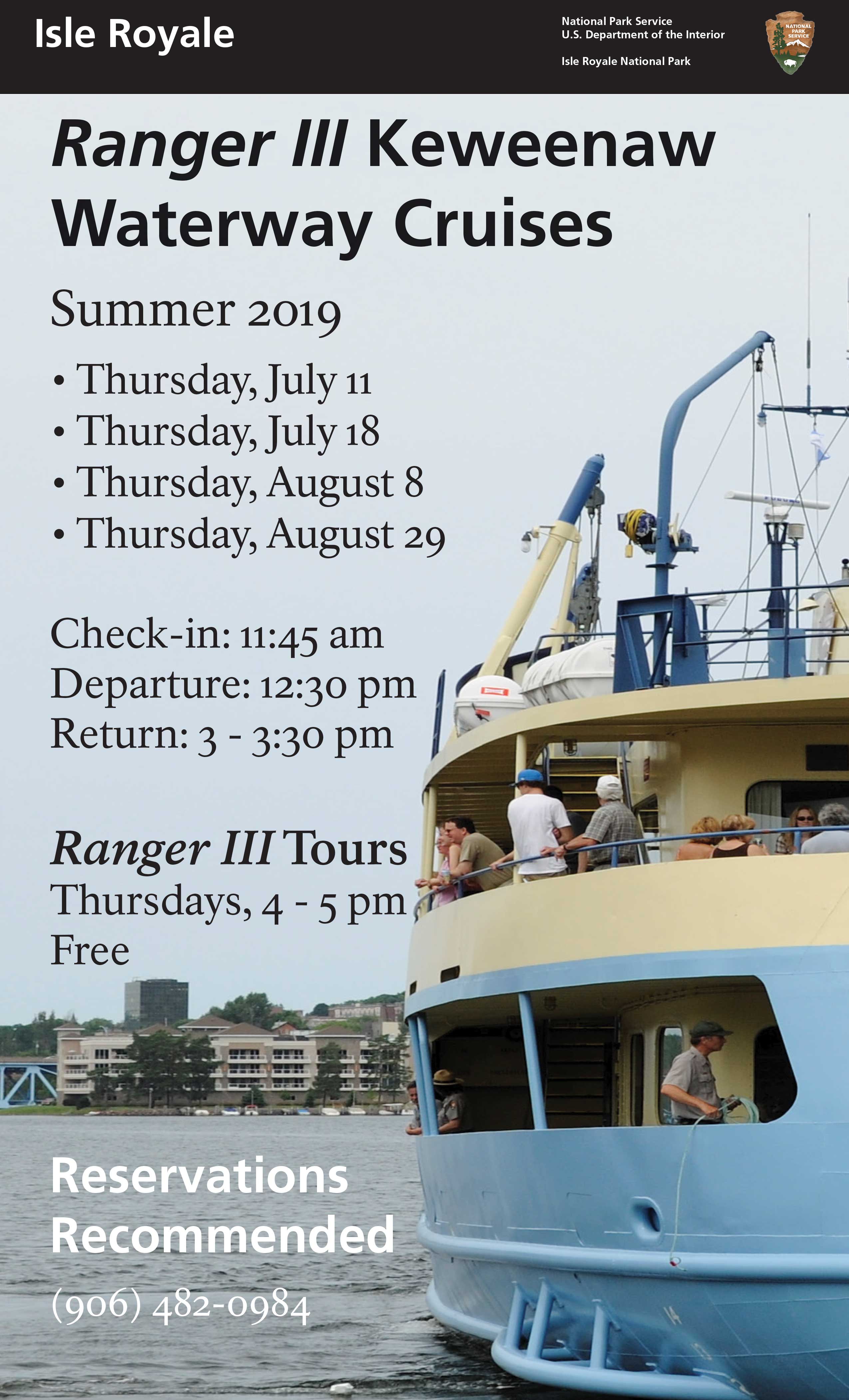 Passengers aboard the Ranger III ferry sailing along the Keweenaw Waterway