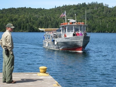 A ferry pulls into a dock