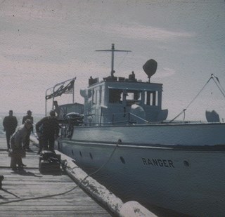 Historic Ranger ferry at a wooden dock