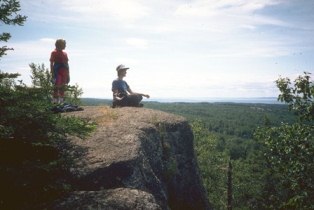 Visitors explore the overlook at Lookout Louise Visitors explore the overlook at Lookout Louise