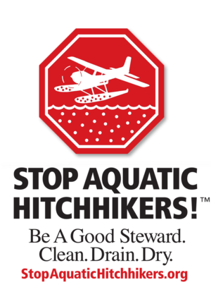 logo for the stop aquatic hitchhikers campaign featuring a seaplane within the bounds of a stop sign