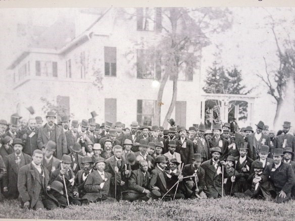 a group of African American men in army suits