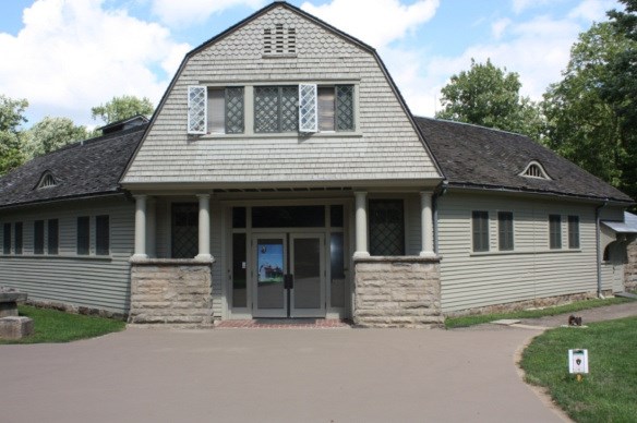 the front of the carriage house which is now the visitor center