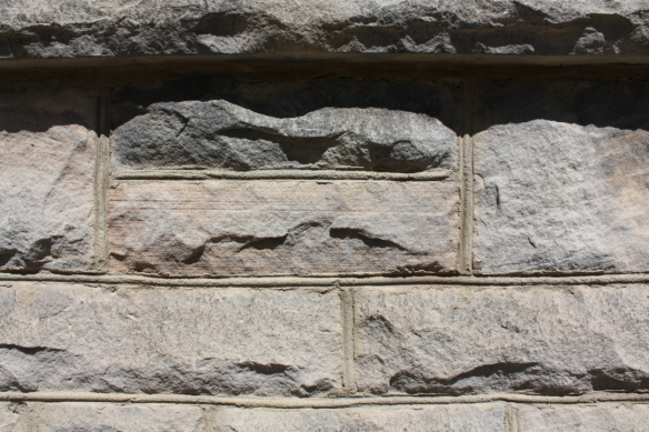 Stone of the Carriage House a close up photo of the stone structure