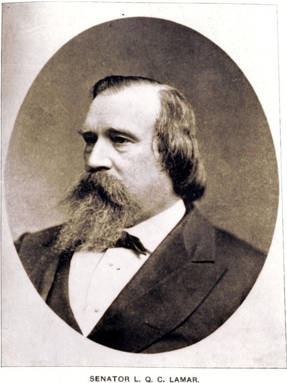 senator-lucius-q-c man sitting is facing to the right