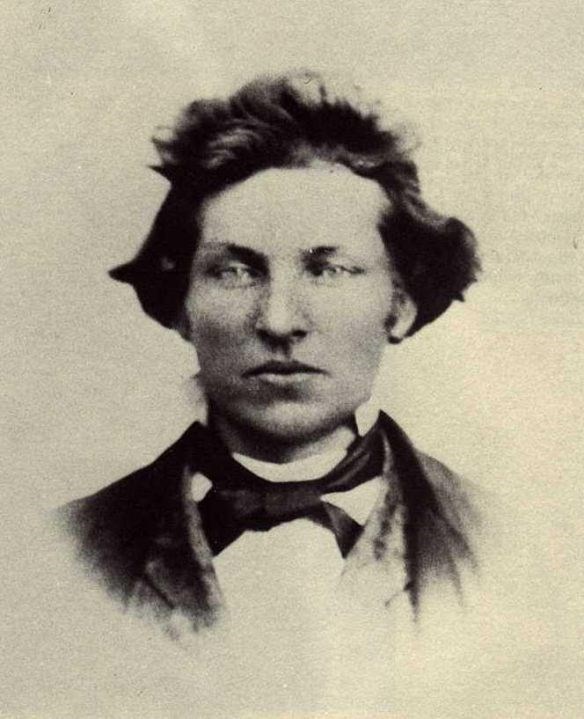 a young man with brown hair- the picture is tinted yellow