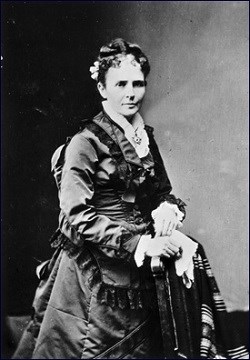 First Lady Garfield sitting in a dress