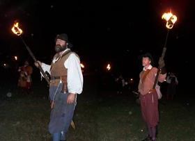 Living History Interpreters portraying Bacon's troops about to burn Jametown