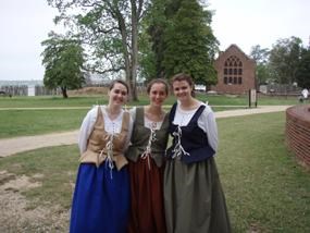 Three high school students dressed up as characters from 17th century Jamestown
