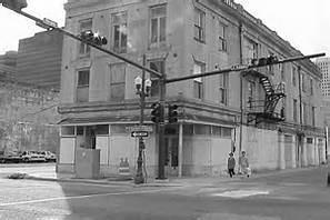 New Orleans Jazz Sites: Then & Now by Karen Armagost.
The picture of the Eagle Saloon (above) links to a PDF with more information about Historic New Orleans Jazz Sites. Black & white image of a three story brick building at the intersection of two streets.