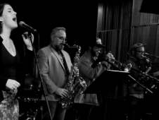Singer and a horn section