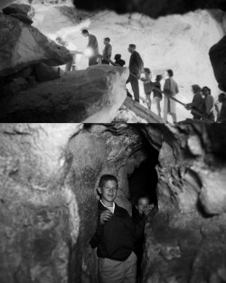 Top image shows 10 cave tour participants climbing a wooden staircase in the cave. The image is black and white with large rocks in the foreground. The bottom image shows 2 young visitors in a narrow cave passageway.