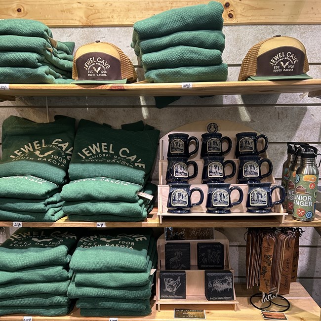 Wooden shelves displaying souenvirs.