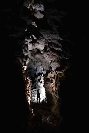 A caver in a large passage in Jewel Cave A caver in a large passage in Jewel Cave