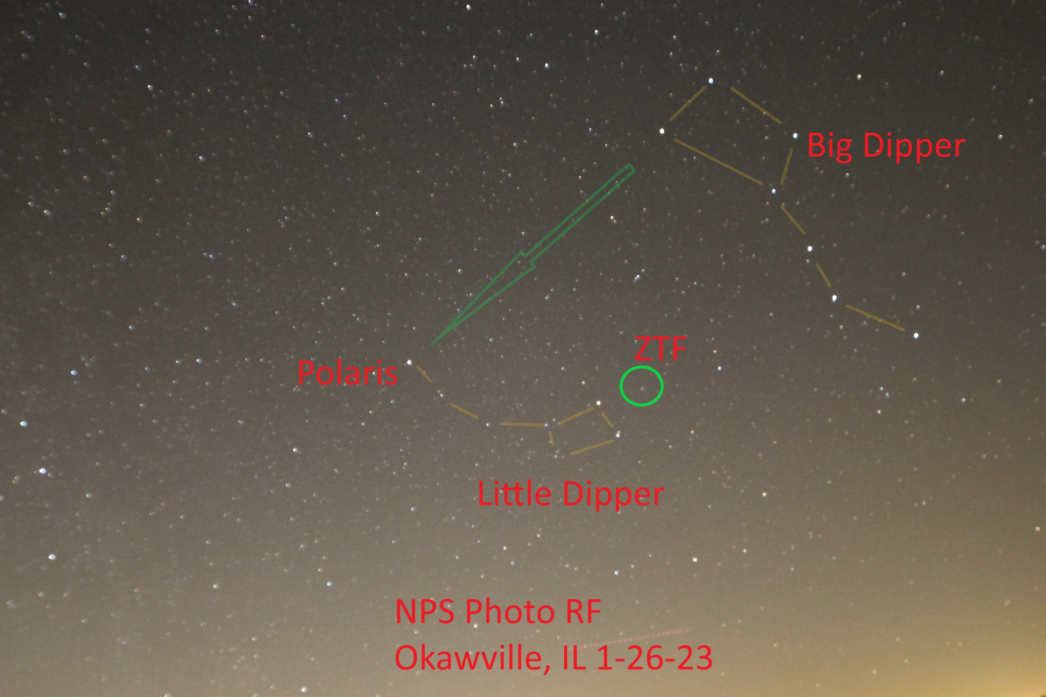 Comet ZTF White dots on a dark background, with red writing.