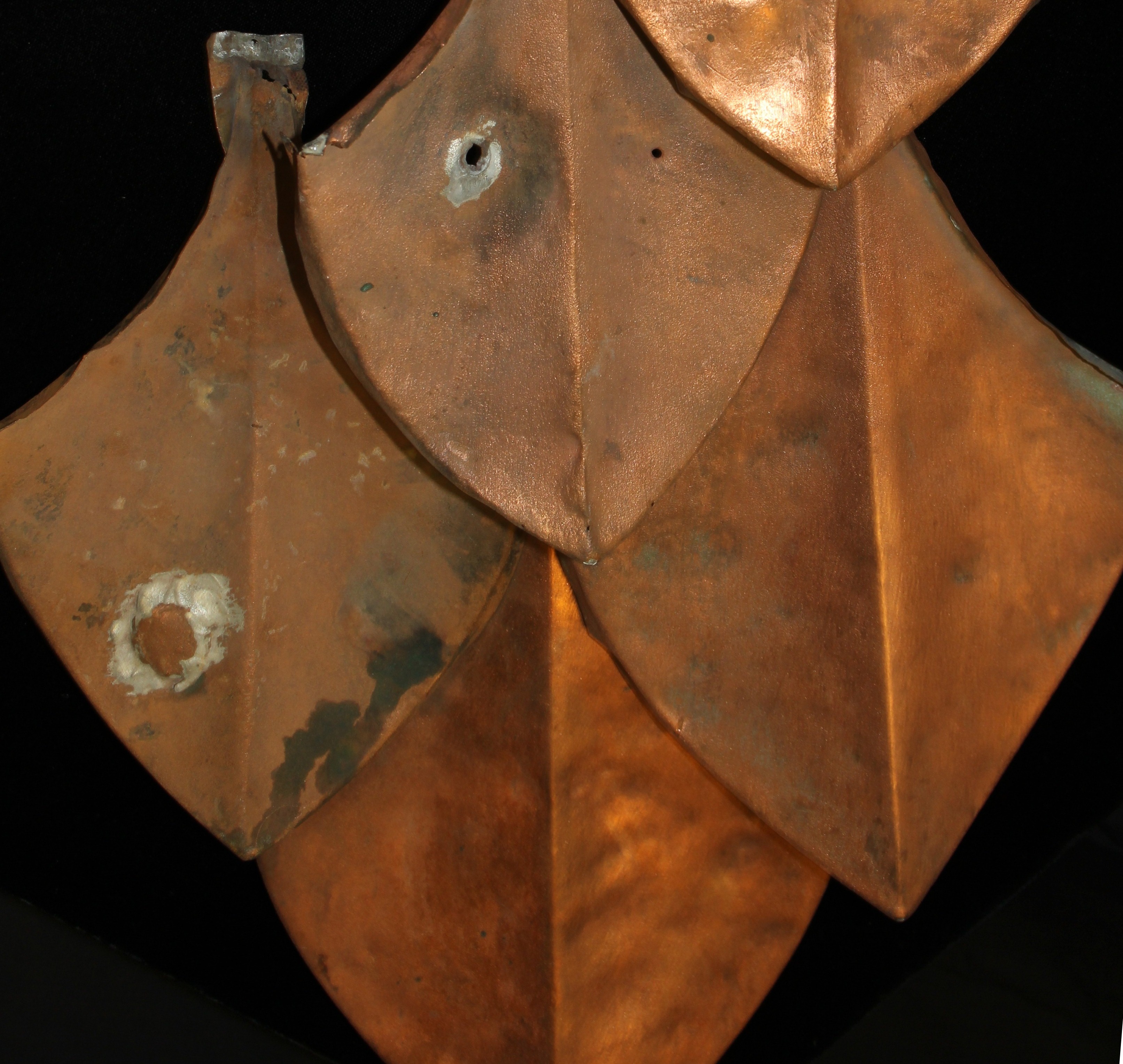 Interlocking copper leaves