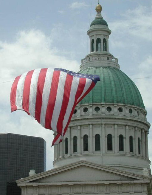 Old Courthouse with large flag in front