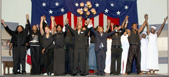Students from Carr-Lane School take a bow after their performance.