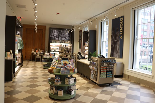 book displays and merchandise in a large room with big windows