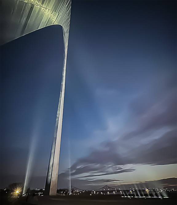 Beams of light shining up on the Arch Beams of light shining up on the Arch
