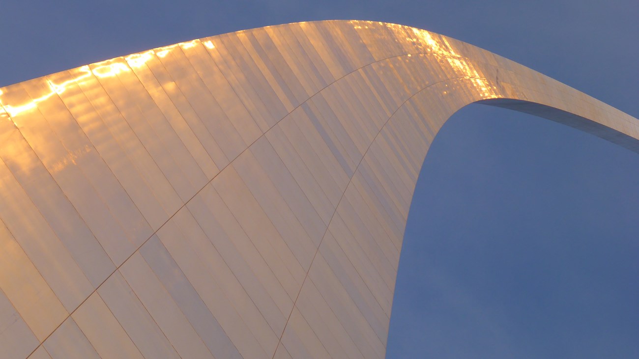 Sun shining on the upper part of the Gateway Arch
