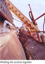 Welding the sections of the Gateway Arch together