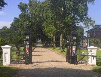 Image of elaborate ironwork gates at Chalmette National Cemetery Image of elaborate ironwork gates at Chalmette National Cemetery