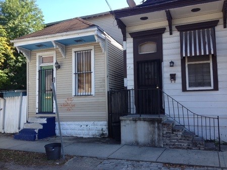 New Orleans houses bearing the painted markings of post hurricane Katrina searches.