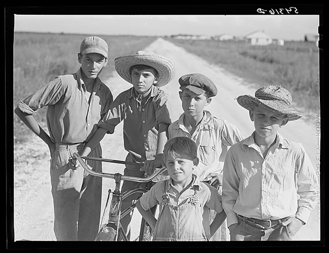 a group of cajun boys pose for a picture