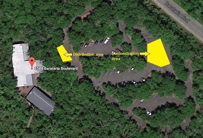 A satellite image showing the locations for a "Demonstration Area" and a "Distribution Area" in the bus parking area outside of the Barataria Preserve Visitor Center in Marrero, LA.