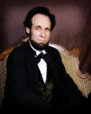 Dennis Boggs as Abraham Lincoln.