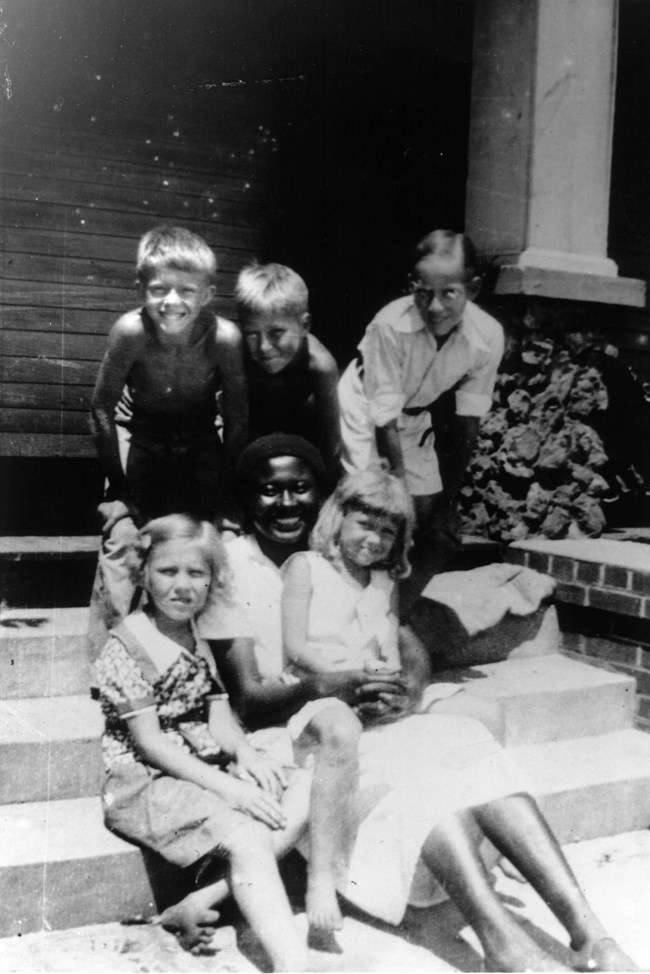 Annie Mae Hollis with the Carter children and their friends