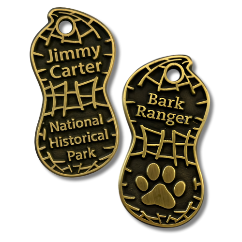 Jimmy Carter National Historical Park BARK Ranger pet tag shaped like a peanut.