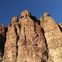 jagged orange pillars of a rock outcrop