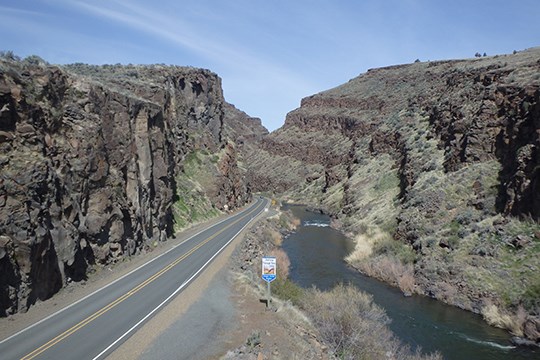 Picture Gorge rock, the road, and the river on a summer day Picture Gorge rock, the road, and the river on a summer day
