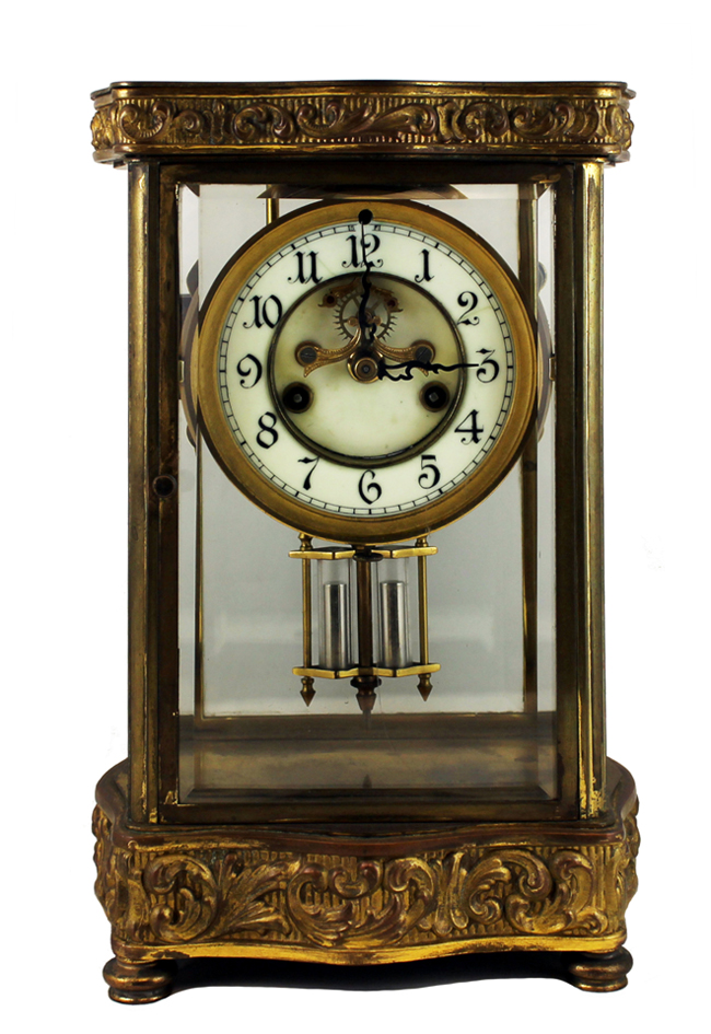 A cased clock with a mercury pendulum from the Beals Street parlor. A cased clock with a mercury pendulum from the Beals Street parlor.