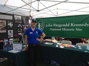 Student Volunteer represents the site at a community event.