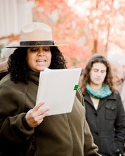 A ranger reading during the memorial service