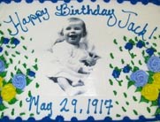 John F. Kennedy baby picture on a birthday cake